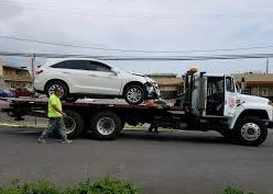 How to perform lift flatbed towing services?